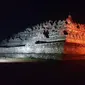 Candi Borobudur di Kabupaten Magelang, Jawa Tengah, diterangi warna oranye pada Sabtu malam, 9 Desember 2017, untuk mendukung penghapusan kekerasan terhadap perempuan dan anak. (Foto: Istimewa/Twitter/@BorobudurPark)