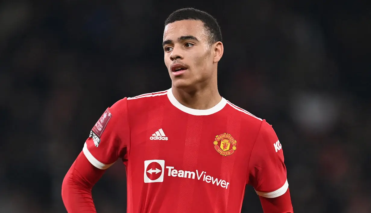 Pemain MU, Mason Greenwood menjadi pesepak bola teranyar yang sempat dipenjara akibat tindak kriminal. Sebelumnya, telah banyak kasus yang mengharuskan pesepak bola mendekam dalam jeruji besi untuk mempertanggung jawabkan perbuatan kriminalnya. siapa saja? (AFP/Paul Ellis)