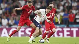 Jack Grealish - Kehadiran pemain Aston Villa yang masuk menggantikan Bukayo Saka di menit 69 ini membuat sektor kiri serangan Inggris menjadi lebih hidup. Pergerakannya benar-benar membuat para bek Denmark kocar-kacir. (Foto:AP/Laurence Griffiths, Pool)