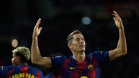 Ekspresi Robert Lewandowski usai menjebol gawang Real Sociedad, Minggu (28/9/2025) (AP Photo/Joan Monfort)