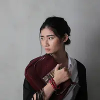 Perempuan bekerja./Copyright unsplash.com/@ambarsimpang