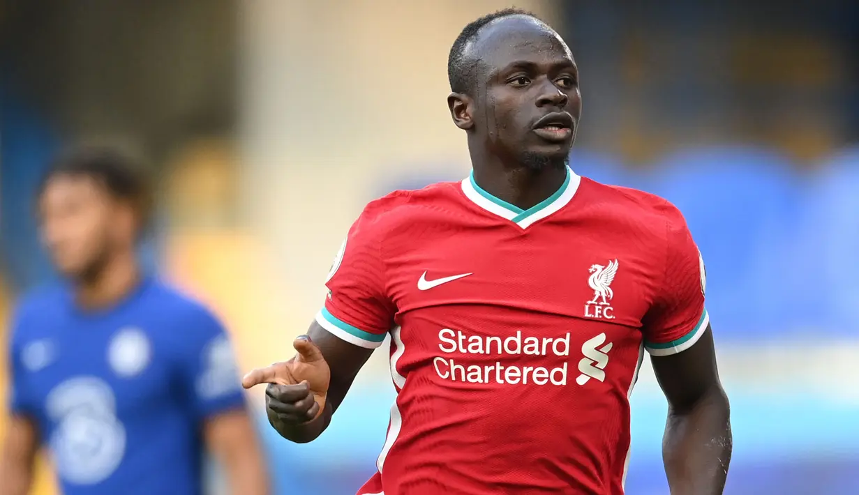 Sadio Mane tampil impresif dengan membawa Liverpool ke peringkat ketiga Liga Inggris musim ini. Bersama Senegal, ia telah mengoleksi 25 gol dan 18 assist dalam 78 penampilannya di semua ajang. Mane tentu akan menjadi tulang punggung negaranya di Piala Afrika 2021 ini. (AFP/Michael Regan)