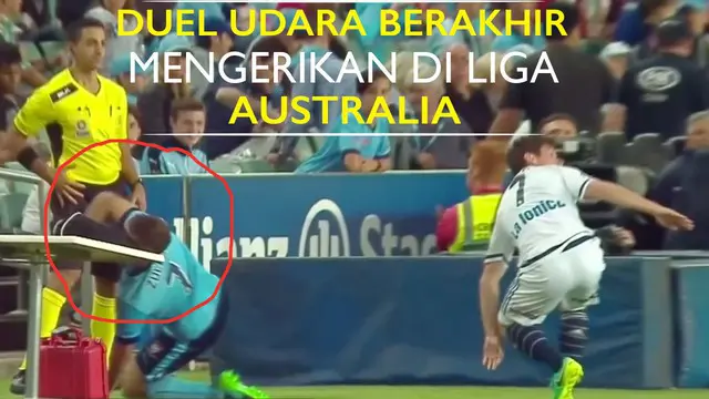 Video duel udara antara Michael Zullo dengan Marco Rojas di Liga Australia yang berakhir dengan menghantam meja wasit di pinggir lapangan.