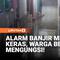 Alarm Early Warning System (EWS) berbunyi keras menyusul naiknya tinggi muka air Kali Bekasi, Selasa. Peristiwa tersebut menyebabkan banjir merendam Kampung Lebak, Kelurahan Teluk Pucung, Kecamatan Bekasi Utara, Kota Bekasi, Jawa Barat, hingga memaks...