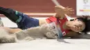 Maegawa Kaede atlet Jepang beraksi di nomor lompat jauh putri klasifikasi T42-44/61-64 pada Asian Para Games 2018, di Stadion Utama Gelora Bung Karno Jakarta, Selasa (9/10/2018).  (Bola.com/Peksi Cahyo)