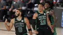 Pebasket Boston Celtics, Jayson Tatum, melakukan selebrasi usai memasukan bola saat melawan Toronto Raptors pada semifinal playoff Wilayah Timur NBA, Rabu (2/9/2020). Celtics menang dengan skor 102-99. (AP Photo/Mark J. Terrill)