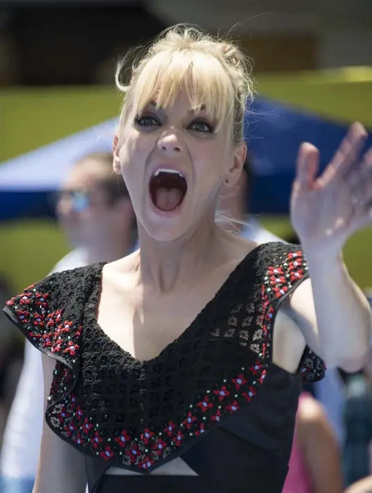 Janney mengatakan, Anna merupakan orang yang professional lantaran bisa menjaga dengan baik masalah yang sedang dihadapinya saat ini. Senyumannya pun kian mempesona dalam menjalani pekerjaannya. (AFP/Valerie Macon)