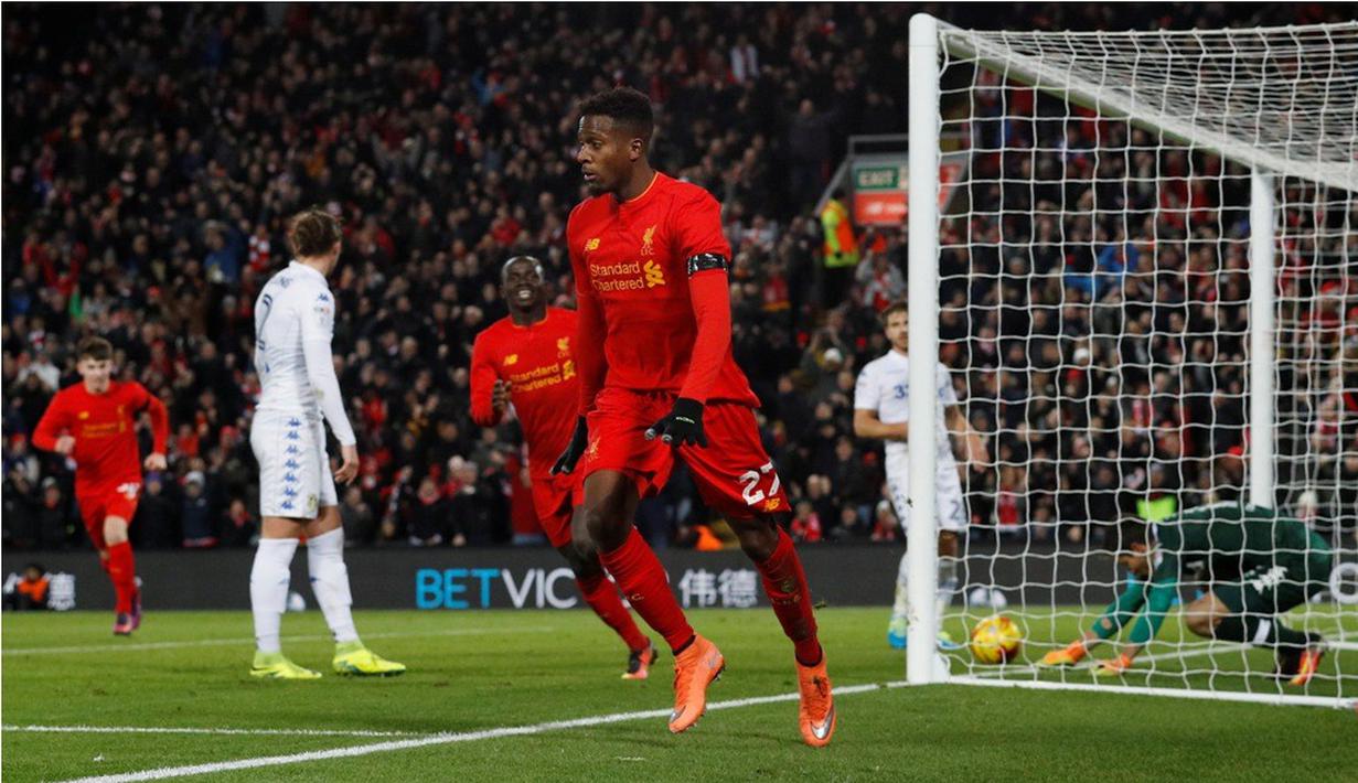 Ekspresi pemain Liverpool, Divock Origi, setelah mencetak gol pertama ke gawang Leeds United pada laga perempat final Piala Liga Inggris di Stadion Anfield, Selasa (29/11/2016). (Reuters/Phil Noble)