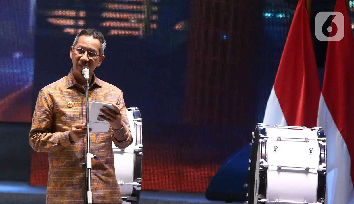 Penjabat (Pj) Gubernur DKI Jakarta Heru Budi Hartono memberikan sambutan saat pembukaan Jakarta Fair Kemayoran 2023 di JIExpo Kemayoran, Jakarta, Rabu (14/6/2023). (Liputan6.com/Herman Zakharia)