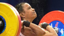 Medali Olimpiade pertama Lisa Rumbewas hadir saat pergelaran Olimpiade Sydney pada tahun 2000. Ketika itu Lisa meraih perak angkat besi nomor 48 kg putri. (AFP/Patrick Hertzog)