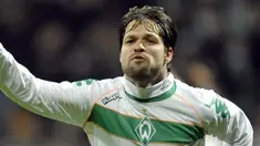 Werder Bremen's midfielder Diego celebrates after scoring during the Werder Bremen vs AC Milan UEFA Cup round of 32 match in Bremen February 18, 2009. The match ended 1-1. AFP PHOTO/JOHN MACDOUGALL