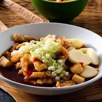 Resep Kupat Bongkok khas Tegal./Copyright depositphotos.com/AI Generator