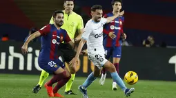 Empat gol Girona masing-masing dicetak oleh Artem Dovbyk, Miguel Gutierrez, Valery Fernandez, dan Cristhian Stuani. (AP Photo/Joan Monfort)