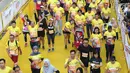 Peserta mengikuti acara BNI-UI Half Marathon 2019 di Kampus Universitas Indonesia, Depok, Jawa Barat, Minggu (7/7/2019). BNI UI Half Marathon 2019 yang diikuti 4800 peserta dengan kategori 5K, 10K, dan 21K (half marathon) diselenggarakan dalam rangka HUT ke-73 BNI. (Liputan6.com/Herman Zakharia)