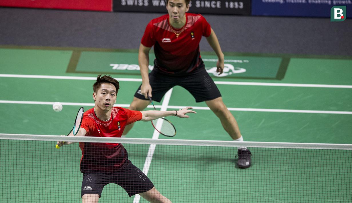 Pasangan Indonesia,Kevin Sanjaya/Marcus Fernaldi Gideon saat menghadapi wakil China Taipei, Lee Jhe-Huei/Lee Yang, pada laga semifinal bulutangkis Asian Games di Istora Senayan, Jakarta, Senin (27/8/2018). (Bola.com/Vitalis Yogi Trisna)