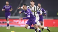 Franck Ribery dan Aaron Ramsey pada pertandingan Liga Italia antara Juventus dan Fiorentina, di Stadion Allianz di Turin, Italia, Selasa, 22 Desember 2020. (Fabio Ferrari / LaPresse via AP)