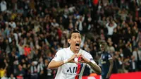 Pemain sayap Paris Saint-Germain (PSG), Angel Di Maria melakukan selebrasi usai mencetak gol ke gawang Real Madrid pada laga Grup A Liga Champions di Parc des Princes, Rabu (18/9/2019). PSG berhasil menaklukkan tamunya Real Madrid 3-0. (AP Photo/Francois Mori)