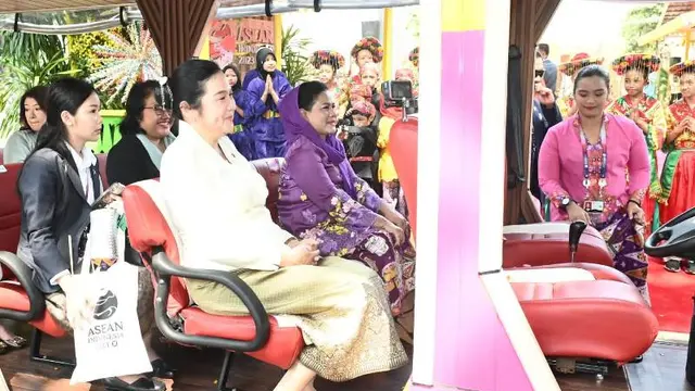 Anggun dengan Kebaya Ungu, Iriana Jokowi Ajak Para Pendamping Pemimpin KTT ASEAN Keliling TMII