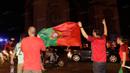 Sejarah tercipta dan Portugal berhasil membuktikan diri, sempat terseok-seok pada babak grup namun akhirnya keluar sebagai juara. (Bola.com/Vitalis Yogi Trisna)