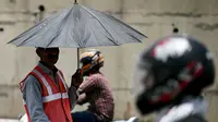 Suhu di ibu kota India ini telah melonjak ke rekor tertinggi 49,9 derajat Celcius (121,8 derajat Fahrenheit). (Arun SANKAR/AFP)