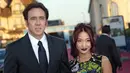 Nicolas Cage bertemy Alice Kim pada 2004 yang bekerja sebagai pelayan. Mereka menikah dua bulan kemudian dan kemudian bercerai paada 2016. (CHARLY TRIBALLEAU / AFP)