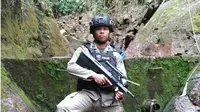 Anggota Satuan Brigade Mobile (Sat Brimob) Polda Gorontalo Brigadir Herik Kriswanto Daud meninggal saat melaksanakan tugas kemanusiaan di Palu, Sulawesi Tengah, Selasa (13/11). (Liputan6.com/Arfandi Ibrahim)