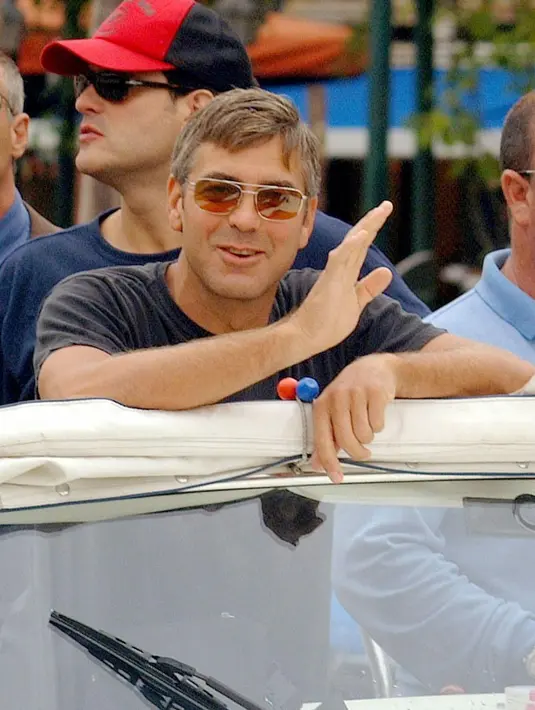 Heathet McGrown mengaku puas setelah bertemu dengan George Clooney yang menyambutnya dengan sangat baik. "Saya merasa seperti semua impian telah terwujud. Saya senang dengan tanggapannya yang begitu hangat."  (Bintang/EPA)