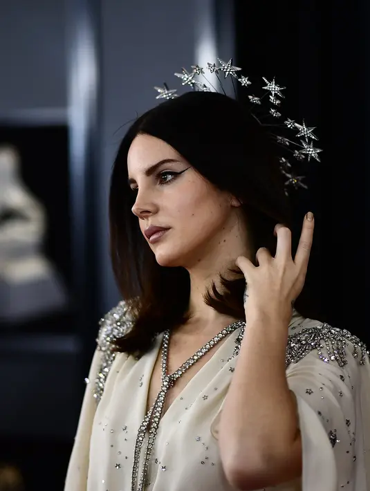 Dilansir dari E! News, polisi Orlando medapatkan sebuah peringatan atas ancaman penculikan untuk penyanyi Lana Del Rey. (JEWEL SAMAD / AFP)
