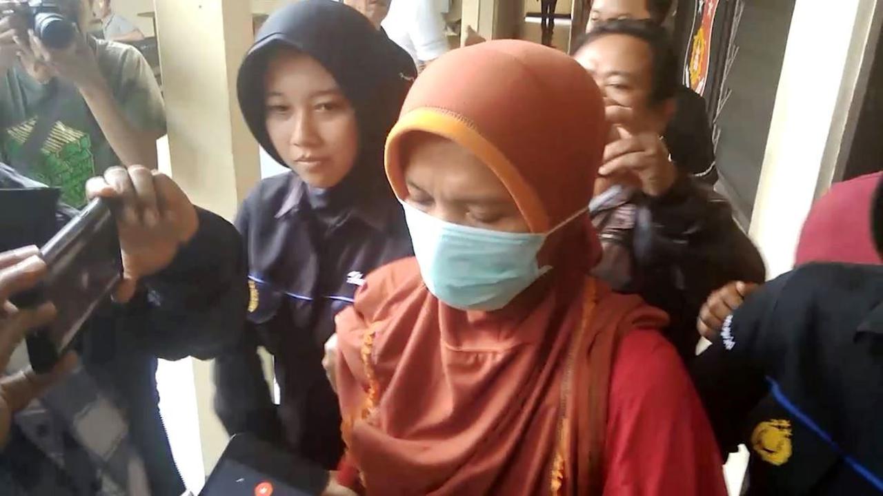 AM, ibu tiri IMK, telah ditetapkan sebagai tersangka penganiyaan anak tirinya. (Foto: Liputan6.com/Muhamad Ridlo).
