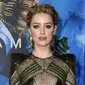 Ekspresi Amber Heard saat menghadiri premier film terbarunya, "Aquaman" di Los Angeles, California, AS (12/12). Amber Heard tampil seksi dengan gaun jaring-jaring menerawang hijau. (AP Photo/ Jordan Strauss)