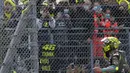 Pembalap Petronas Yamaha SRT, Valentino Rossi, melambaikan tangan kepada para penggemarnya di akhir balapan MotoGP Emilia Romagna di sirkuit Misano, Minggu (24/10/2021). MotoGP Emila Romagna menjadi balapan terakhir Rossi di tanah kelahirannya, Italia. (AP Photo/Antonio Calanni)