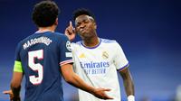 Real Madrid lolos ke perempat final Liga Champions 2021/2022 usai menjungkalkan PSG dengan agregat 3-2. Leg kedua, Real Madrid menang 3-1 di Santiago Bernabeu, Kamis (10/3/2021). (AP/Manu Fernandez)