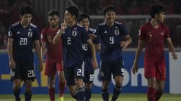 Bek Jepang, Higashi Shunki, merayakan gol yang dicetaknya ke gawang Timnas Indonesia pada laga AFC U-19 Championship di SUGBK, Jakarta, Minggu (25/10). (Bola.com/Vitalis Yogi Trisna)