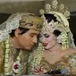 Lucky Hakim dan Tiara Dewi alias Syahrini KW akhirnya resmi menjadi suami-istri. Pernikahan Lucky dan Tiara berlangsung di Masjid At-Tien, Taman Mini Indonesia Indah (TMII), Jakarta. (Herman Zakharia/Liputan6.com)