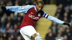 Aston Villa's Ashley Young takes a shot on goal against Doncaster Rovers during the FA Cup 4th round replay match at Villa Park in Birmingham on February 4, 2009. AFP PHOTO / Adrian Dennis