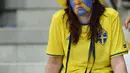 Suporter cantik asal  Swedia terlihat sedih saat timnya kalah dari Belgia pada laga grup E Euro Cup 2016 di Stadion Allianz Riviera, Nice, Kamis (23/6/2016) dini hari WIB. (AFP/Bulent Kilic)