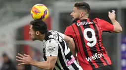 AC Milan menjamu Udinese di laga pembuka pekan ke-27 Liga Italia. Olivier Giroud dan kawan-kawan yang sementara memuncaki klasemen membawa misi untuk meraup 3 poin demi menjauhkan kejaran Inter Milan yang hanya berselisih dua poin. (AP/Luca Bruno)