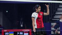 Gregoria Mariska Tunjung beraksi pada penyisihan grup Olimpiade 2024 Paris cabor badminton nomor tunggal putri, Minggu (28/7/2024). (PBSI/Badmintonphoto/Yohan Nonotte)