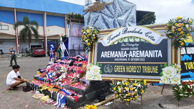 Karangan Bunga untuk Aremania dari Bonek