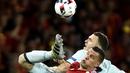 Pemain Hungaria, Adam Szalai (kanan) berduel dengan pemain Belgia, Thomas Vermaelen pada babak 16 besar Piala Eropa 2016 di Stadon Municipal, Toulouse, Prancis, Senin (2//2016) dini hari WIB. Belgia menang 4-0. (EPA/Tibor Illyes)