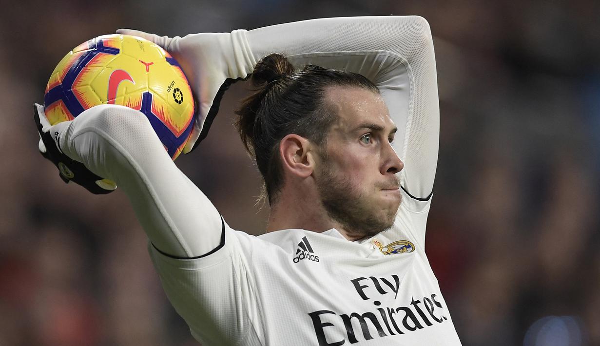 Tottenham Hotspur melepas Gareth Bale ke Real Madrid pada awal musim 2013/2014 dengan nilai transfer sebesar 101 juta euro. Selama 6 musim berseragam Spurs, ia total tampil dalam 237 laga di semua ajang dengan torehan 72 gol dan 60 assist. (AFP/Oscar Del Pozo)