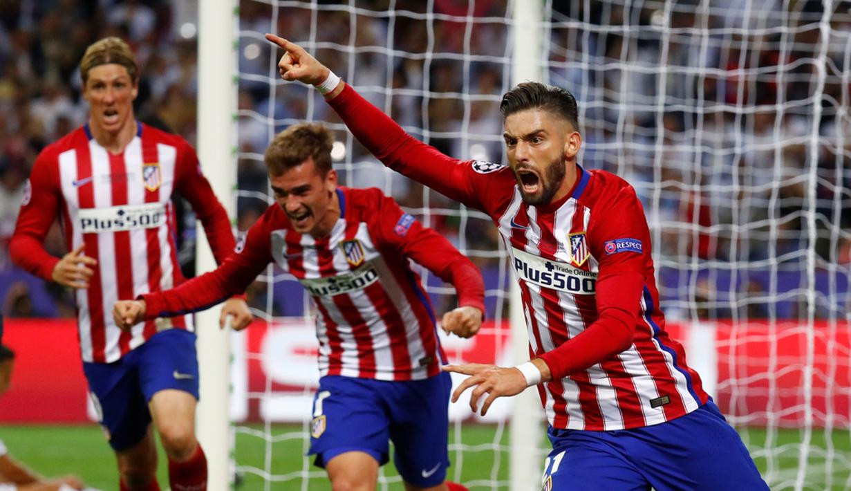 Pemain Atletico Madrid, Yannick Carrasco, mencetak gol balasan ke gawang Real Madrid dalam final Liga Champions di Stadion San Siro, Milan, Minggu (29/5/2016) dini hari WIB. (Reuters/Kai Pfaffenbach)
