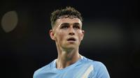 Ekspresi&nbsp;Phil Foden&nbsp;dalam laga Manchester City vs Napoli di Liga Champions 2025/2026, Jumat (19/9/2025). (AP Photo/Dave Thompson)