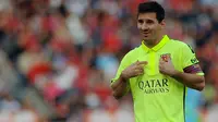 Lionel Messi tunjukkan ekspresi semringah saat cetak hattrick lawan Almeria (AFP)