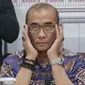 Ketua Komisi Pemilihan Umum (KPU) Hasyim Asy'ari saat memberikan keterangan terkait persiapan debat capres dan cawapres Pemilu 2024 di Gedung KPU, Jakarta, Senin (11/12/2023). (Liputan6.com/Angga Yuniar)