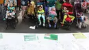 Sejumlah anak penyandang disabilitas pada Peringatan Hari Cerebral Palsy Sedunia di area Car Free Day, Bundaran HI, Jakarta, Minggu (8/10). Setiap tanggal 6 Oktober diperingati sebagai Hari Cerebral Palsy Sedunia. (Liputan6.com/Angga Yuniar)