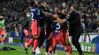 Atletico Madrid lolos ke 16 besar Liga Champions 2021/2022 setelah menang atas FC Porto 3-1 Estadio do Dragao, Rabu (8/12/2021). (AFP/Miguel Riopa)