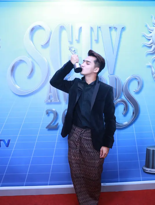 Dua kali Ricky Harun berhasil menyabet penghargaan sebagai Aktor Utama Paling Ngetop versi SCTV Awards. Dengan perolehan itu, ia akan berusaha lebih maksimal kedepannya. (Adrian Putra/Bintang.com)