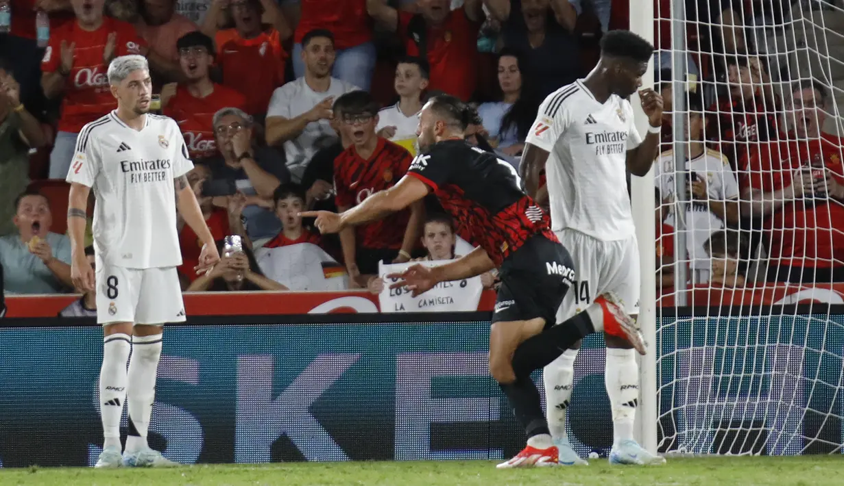 Gol sundulan Vedat Muriqi di babak kedua membatalkan keunggulan Madrid yang sempat didapat berkat gol Rodrygo di babak pertama. (AP Photo/Francisco Ubilla)