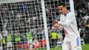 Gelandang Real Madrid, Lucas Vazquez berselebrasi usai mencetak gol ke gawang Getafe pada pertandingan lanjutan La Liga Spanyol di stadion Santiago Bernabeu di Madrid, Minggu (10/4/2022). Real Madrid menang atas Getafe 2-0. (AP Photo/Manu Fernandez)